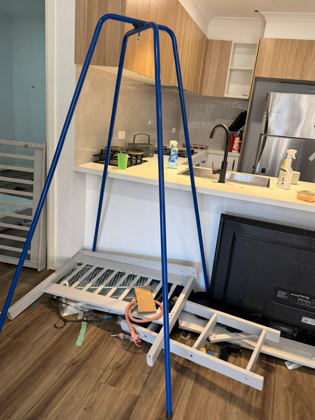 Cluttered kitchen before cleaning