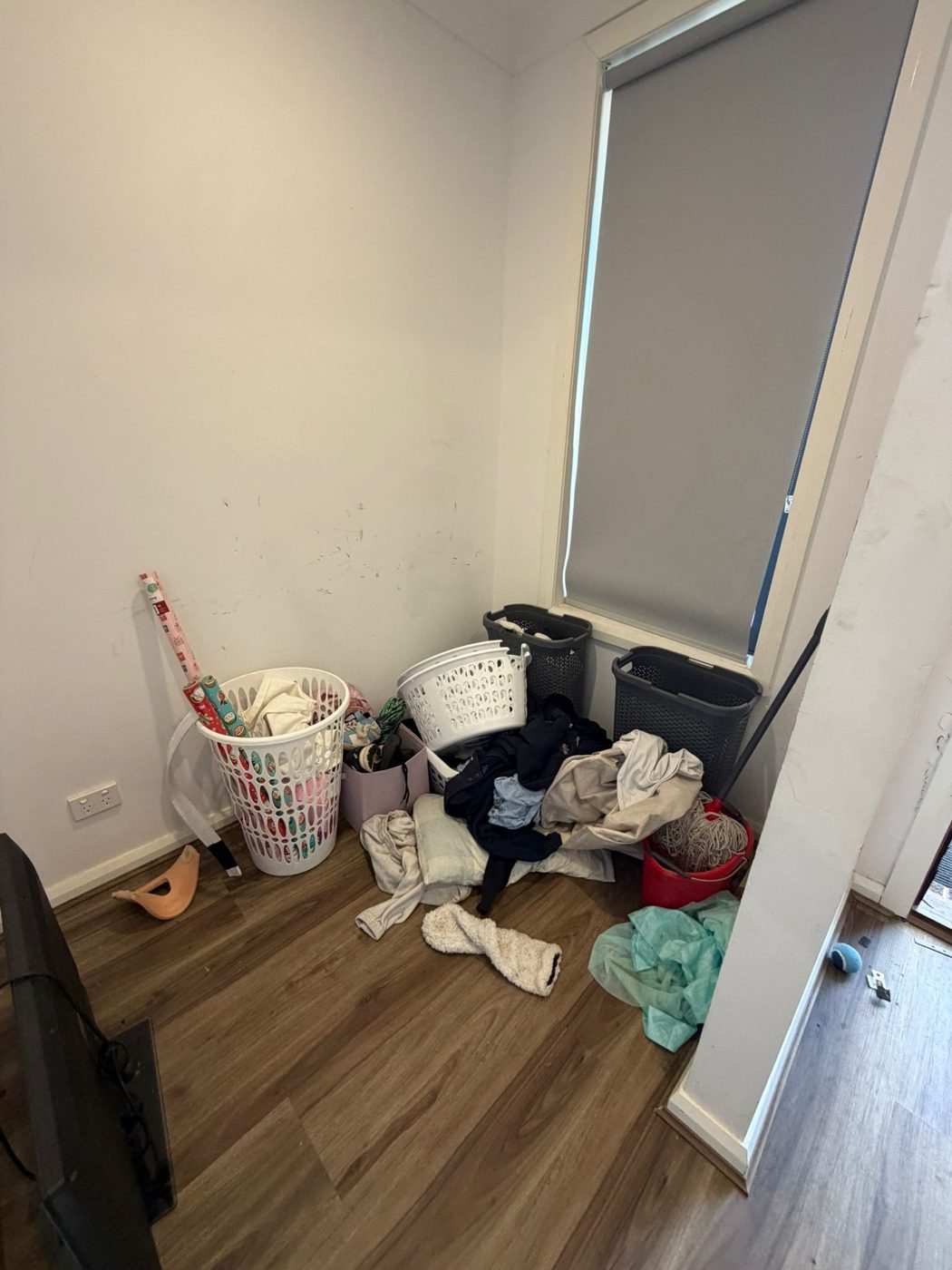 Laundry and clutter before cleaning